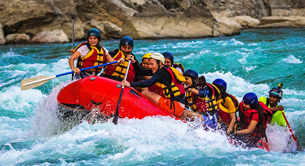 People enjoying rafting